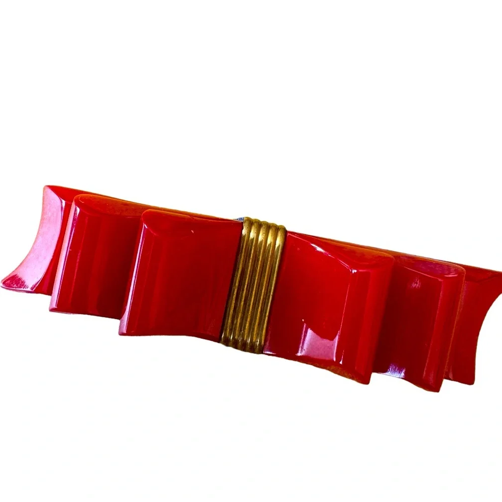 Extremely rare Bakelite red ribbon bow set. Bracelet, earrings, pin. VGUC
